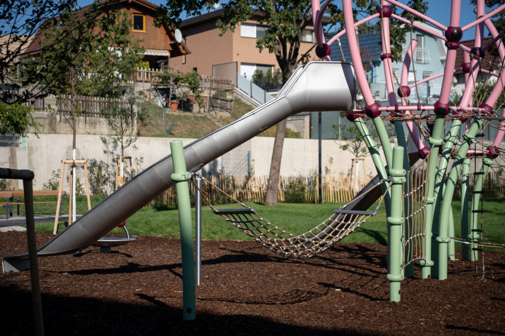 Climbing frame with slide and relaxation hammock
